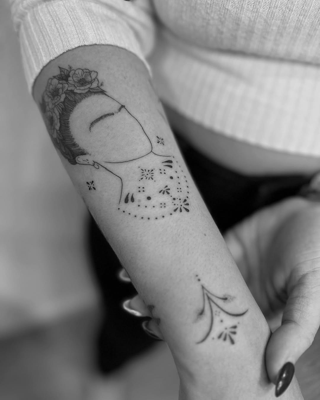 Minimalist depiction of Frida Kahlo tattoo Tattoo Design