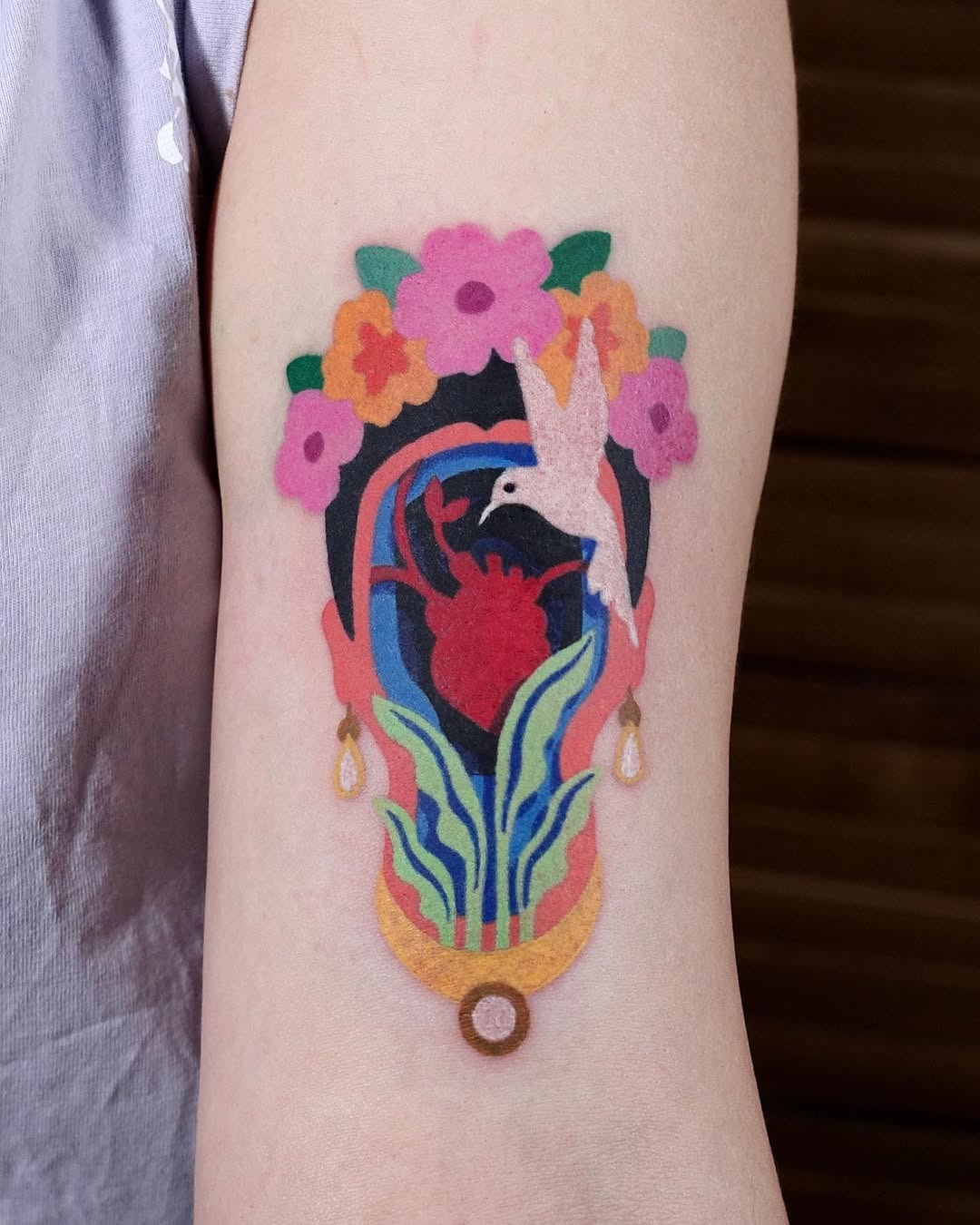 Vibrant Frida Kahlo Tattoo with Floral Elements Tattoo Design
