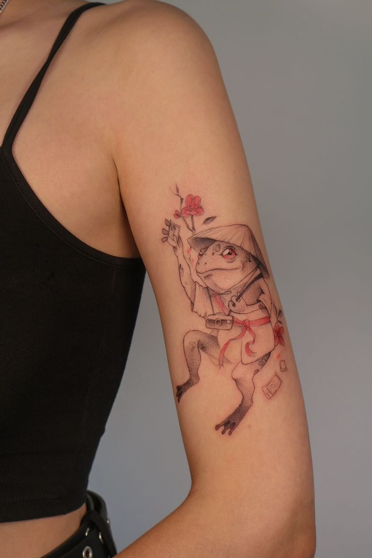 Adventurous Frog With Flower Tattoo Tattoo Design