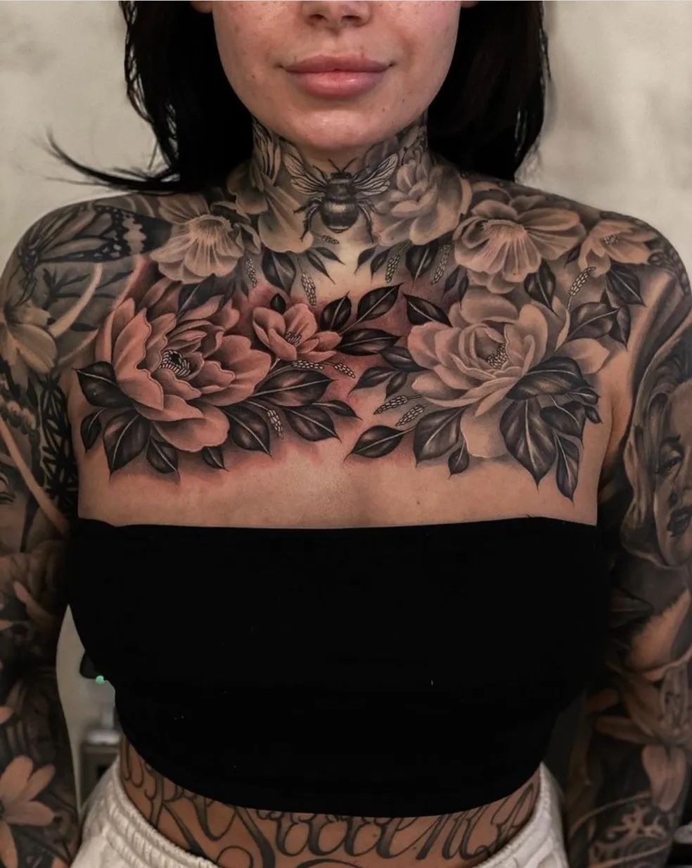 Soft Black Floral Chest and Neck Harmony Tattoo Design