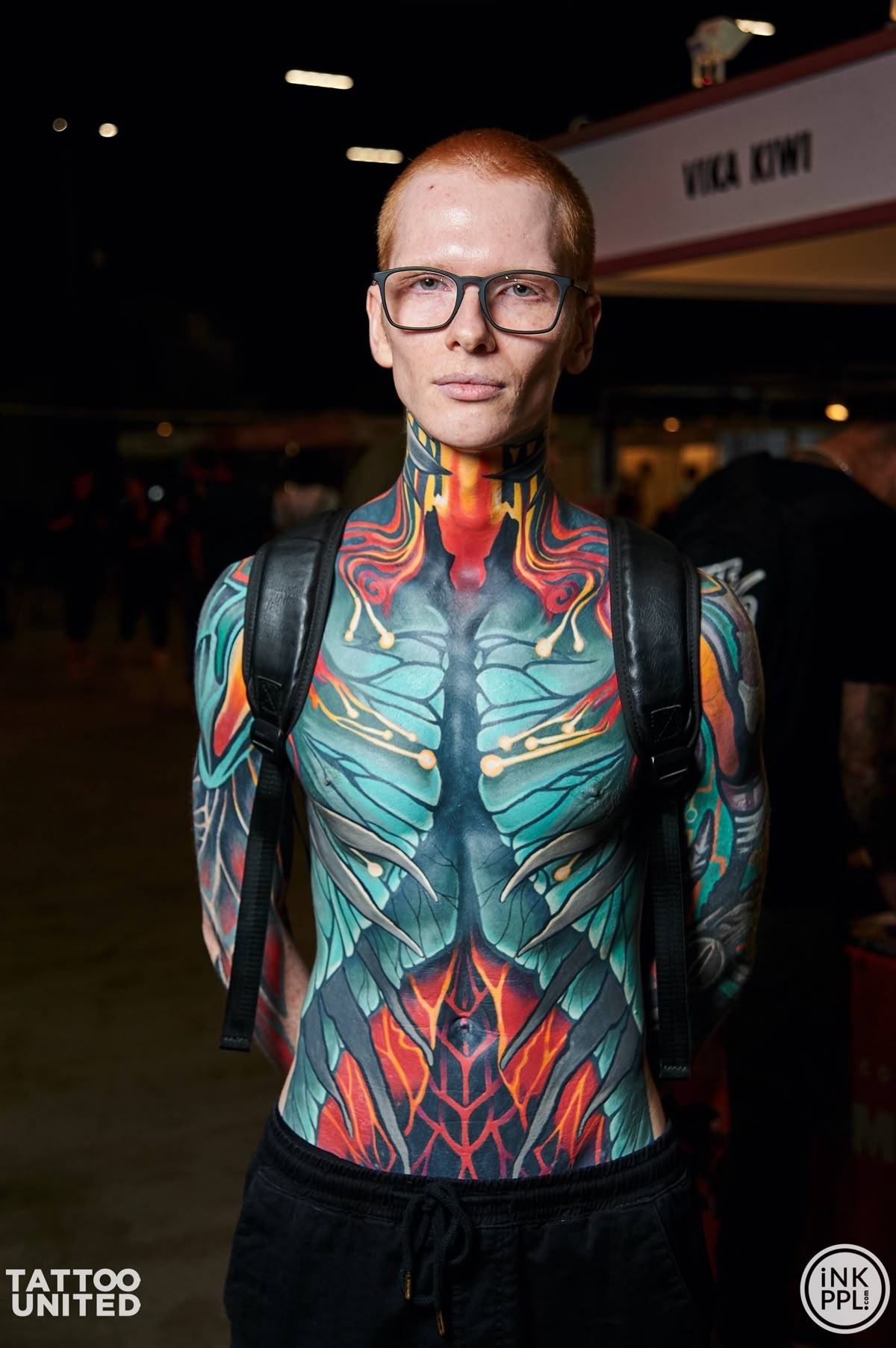Vibrant Anatomical Color Bodysuit Tattoo Design