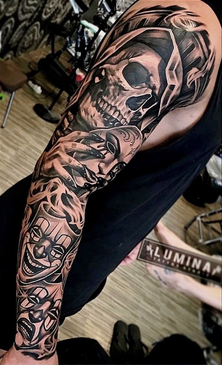 Dark Surreal Skull and Mask Sleeve Tattoo Design