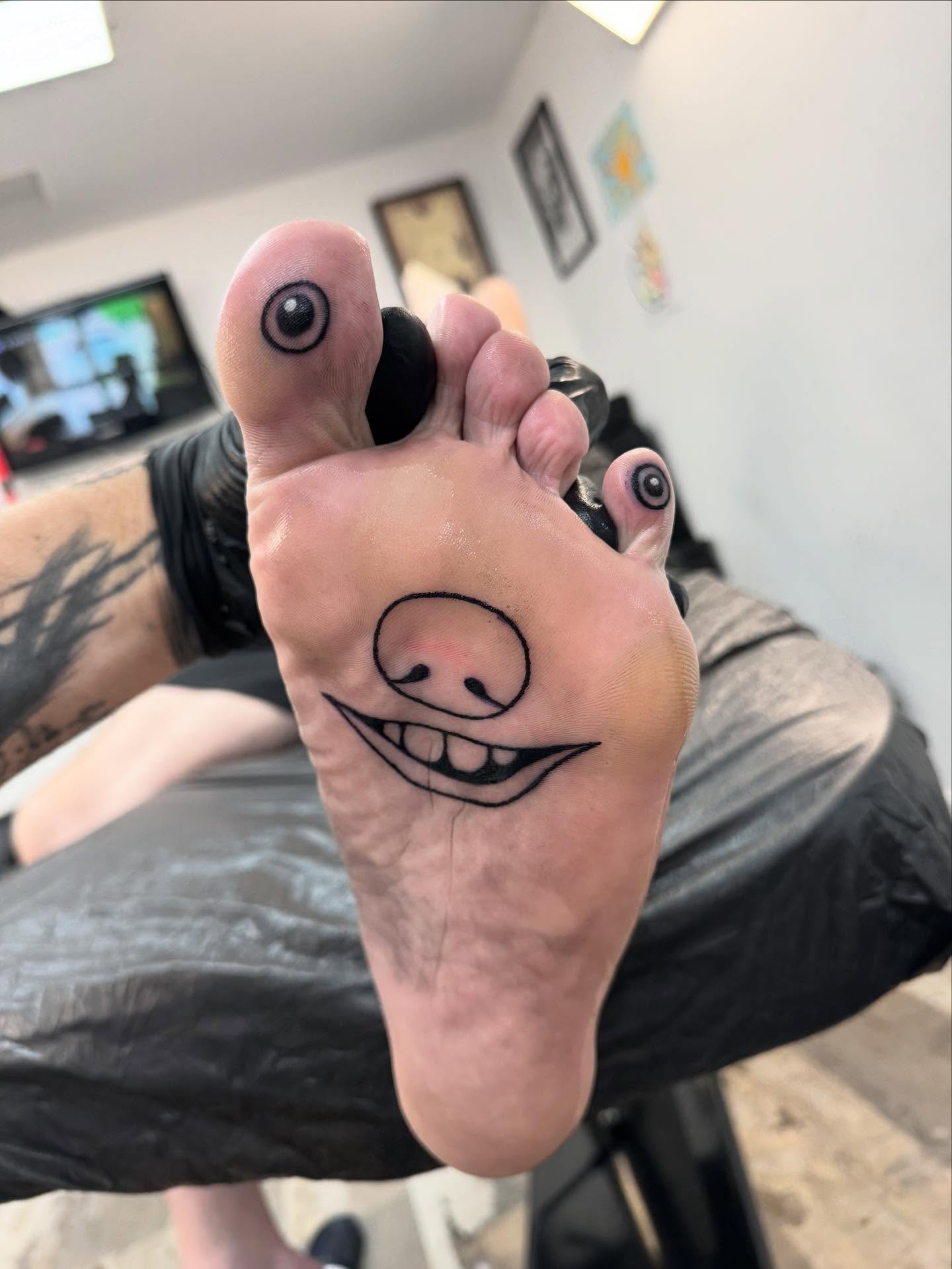 Smiling Foot Face Tattoo Tattoo Design