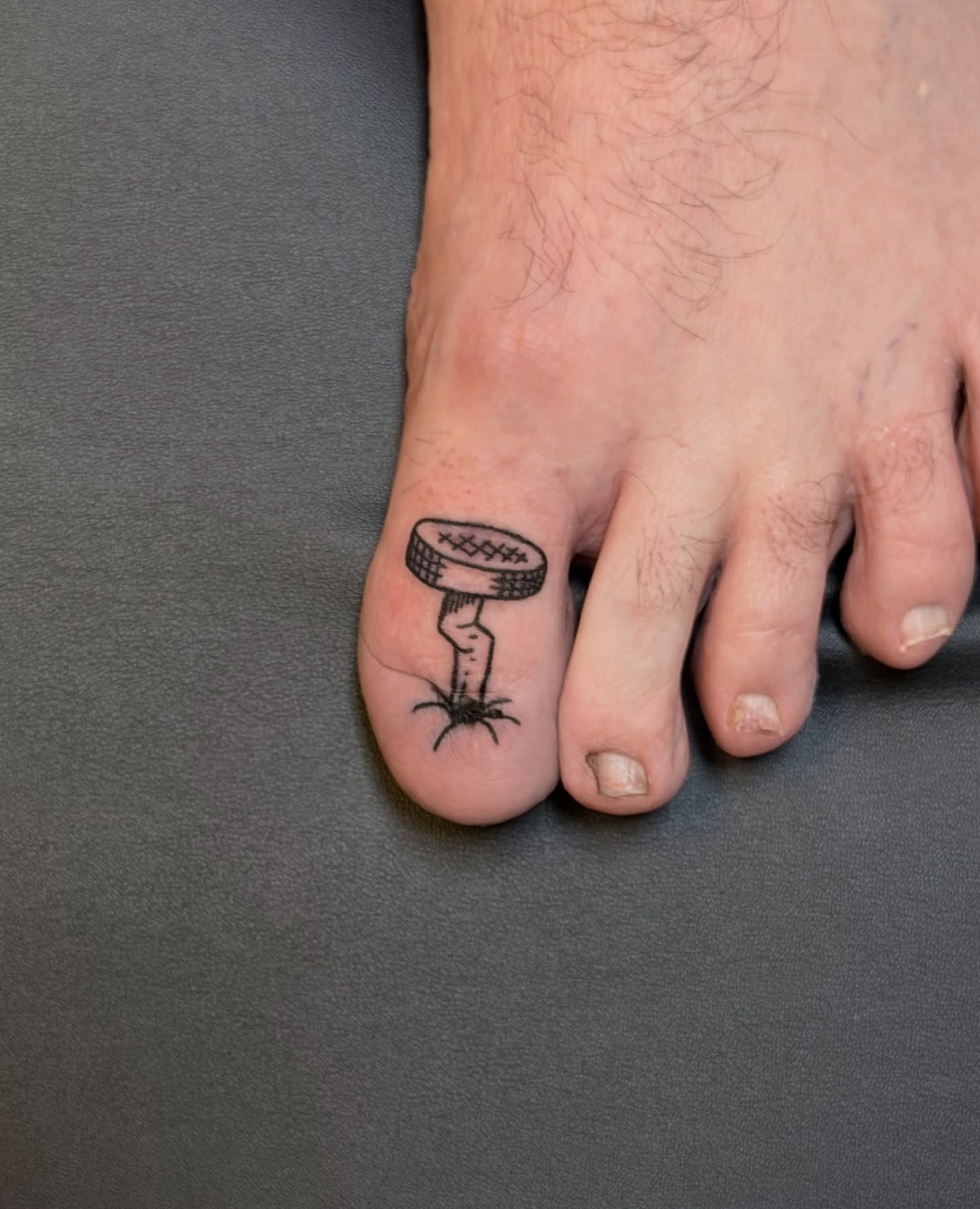 Toe Lifting Tire Tattoo Tattoo Design