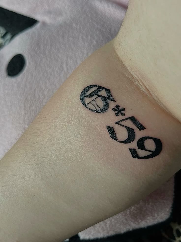 G59 Asterisk Wrist Tattoo Tattoo Design