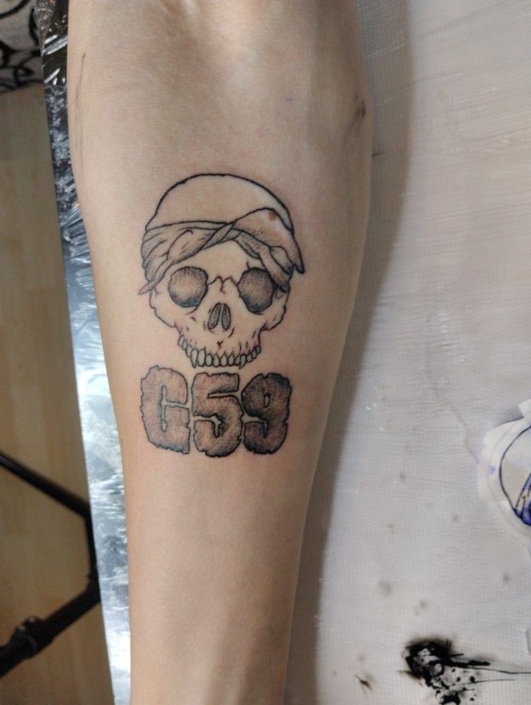 G59 Bold Black Forearm Tattoo Design