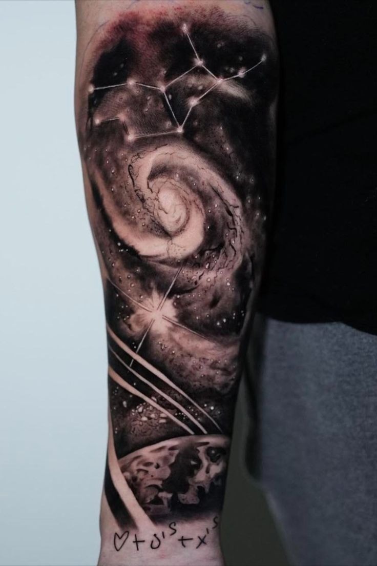 Black and Grey Spiral Galaxy Tattoo, a tattoo design rendered in clean detailed linework.