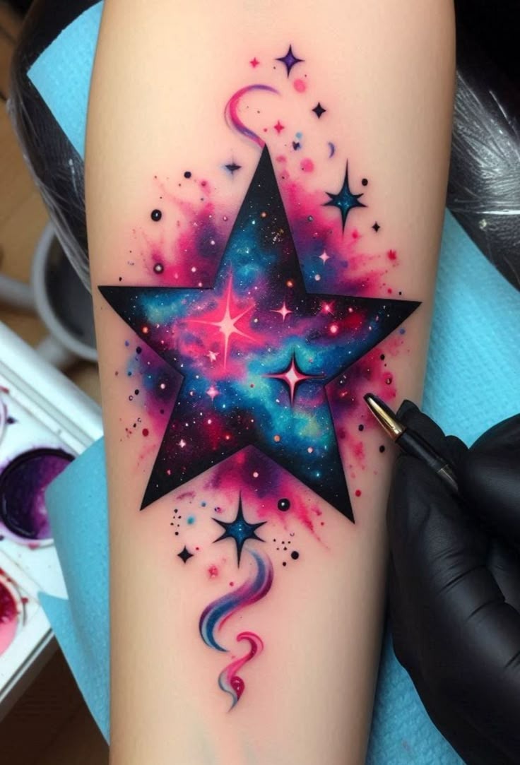 Vibrant Galaxy Star Tattoo, a tattoo design rendered in bold.
