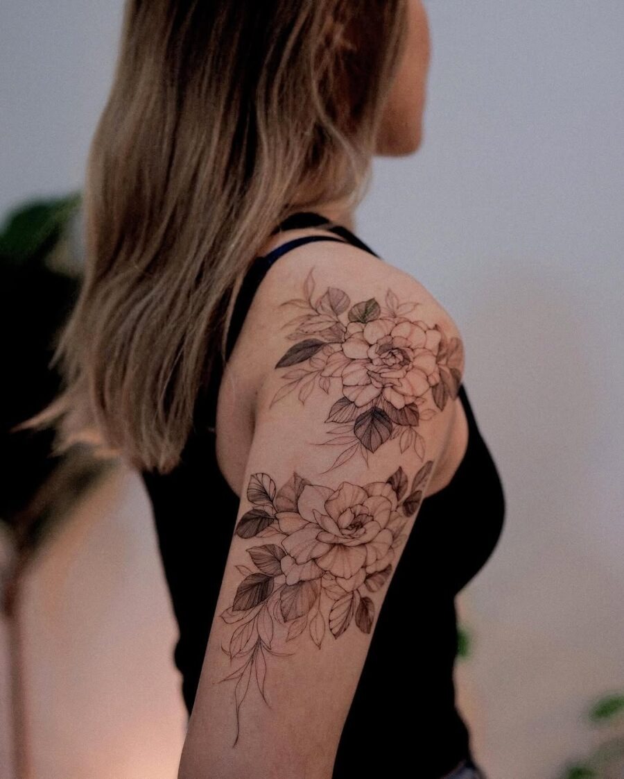 Elegant gardenia tattoo on the upper arm Tattoo Design