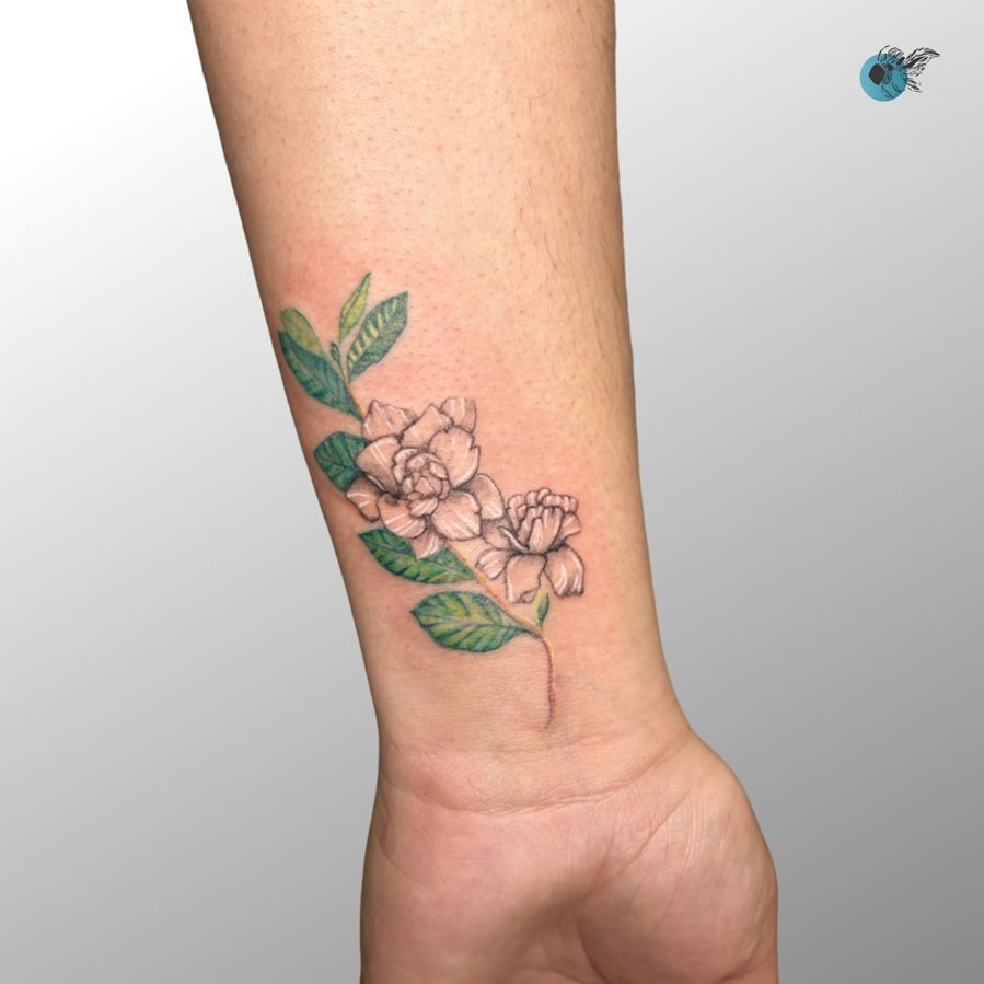 Elegant gardenia tattoo with lush greenery Tattoo Design