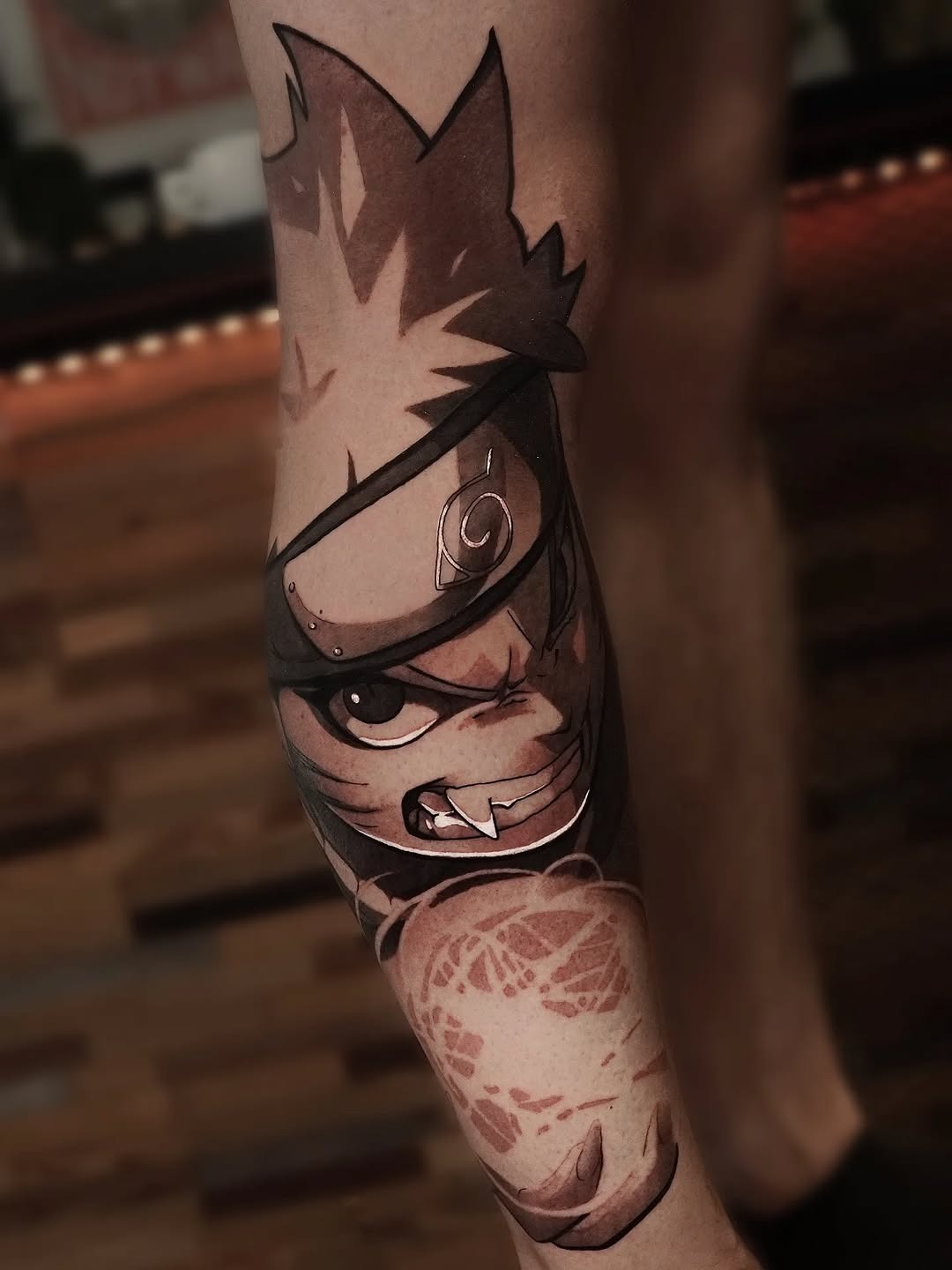 Bold Anime Tattoo of a Fierce Ninja Tattoo Design
