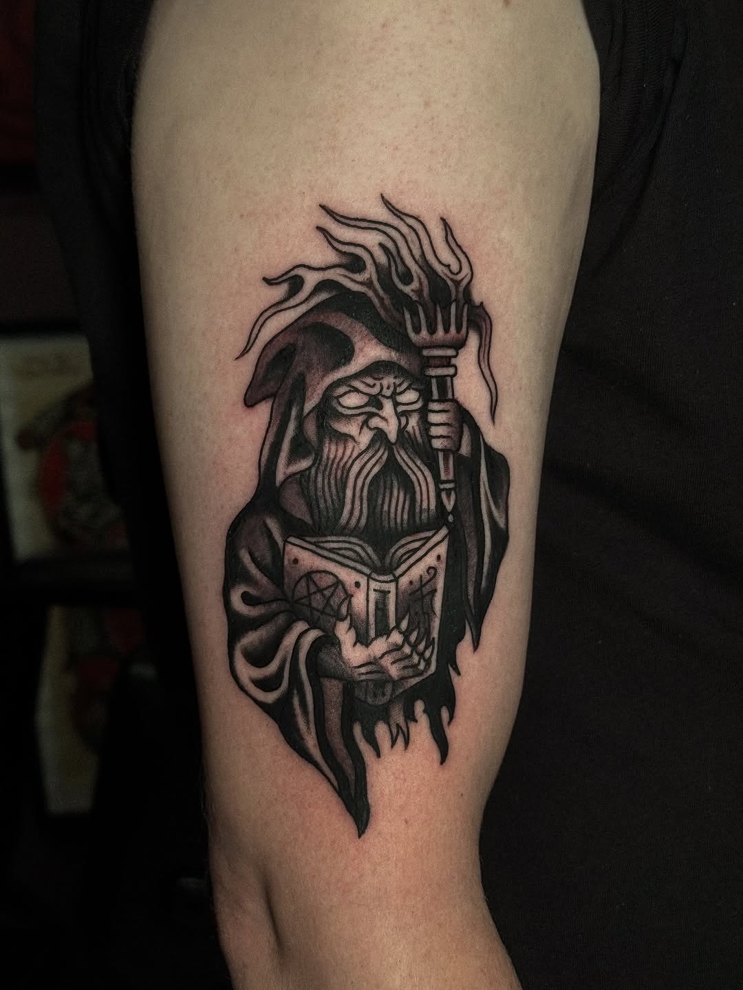 Exquisite Wizard Tattoo Design with Spellbook Tattoo Design