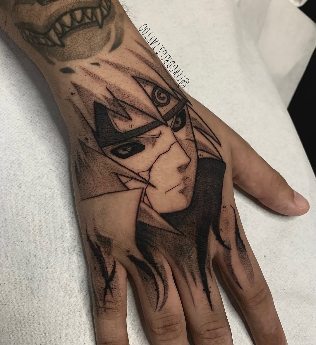 Striking Naruto Hand Tattoo with Bold Lines Tattoo Design