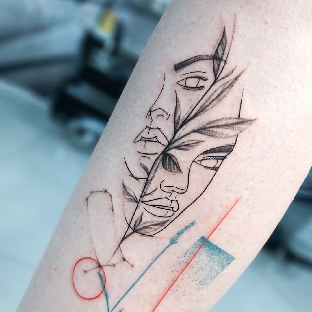 Elegant Gemini Tattoo with a Unique Leaf Design Tattoo Design