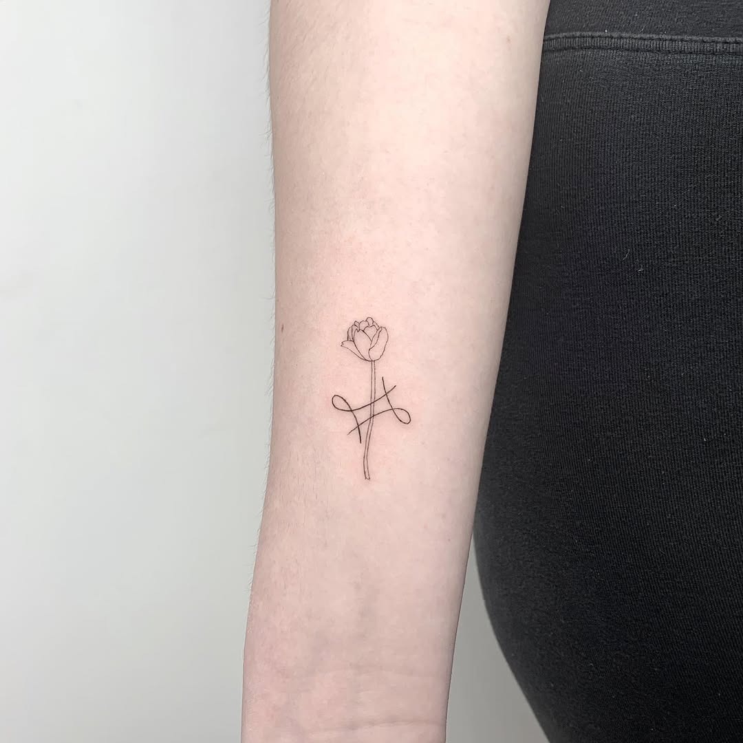 Elegant Minimalist Gemini-Inspired Rose Tattoo Tattoo Design
