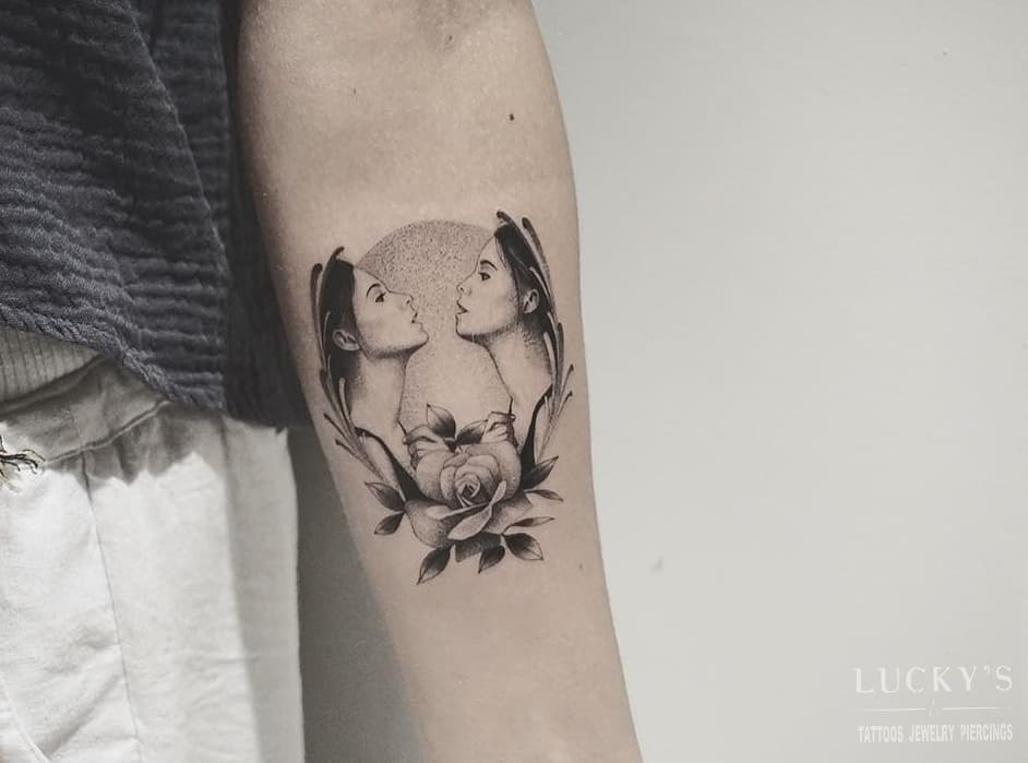 Intricate Gemini tattoo with dual profiles and roses Tattoo Design