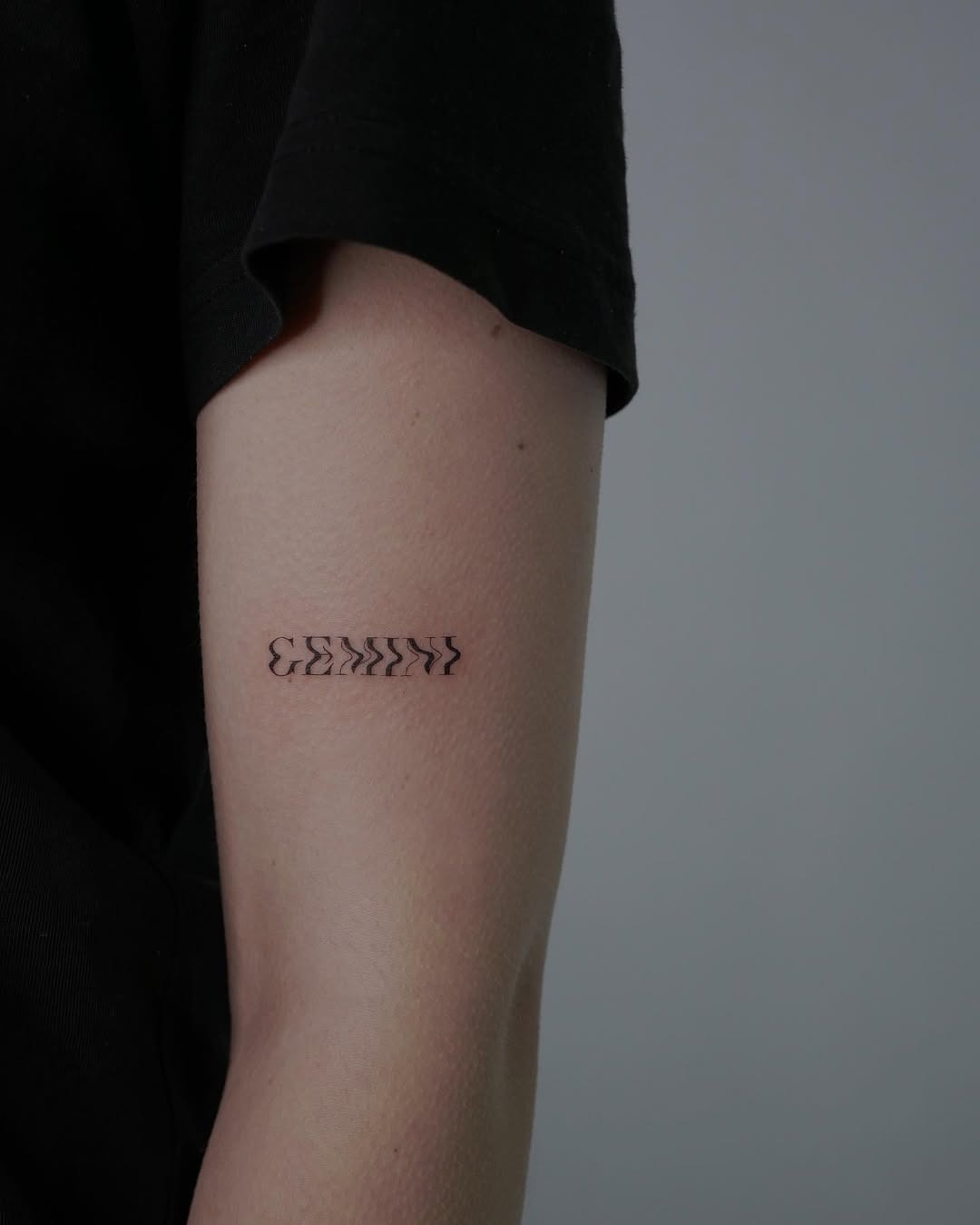Minimalist Gemini Tattoo on the Forearm Tattoo Design