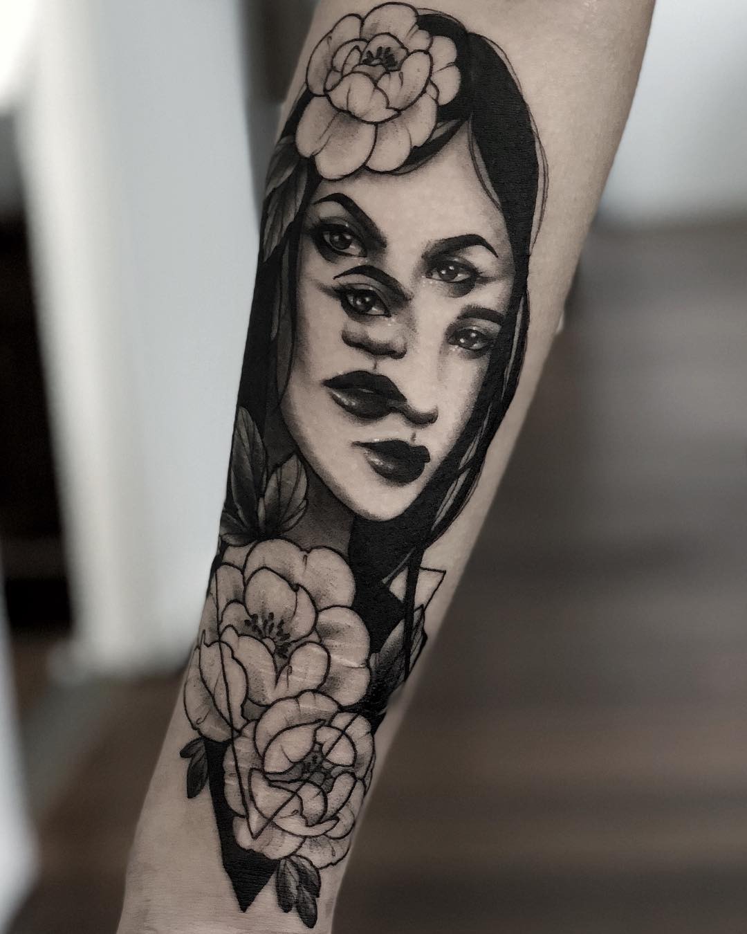 Stunning Gemini Tattoo with Floral Elements Tattoo Design