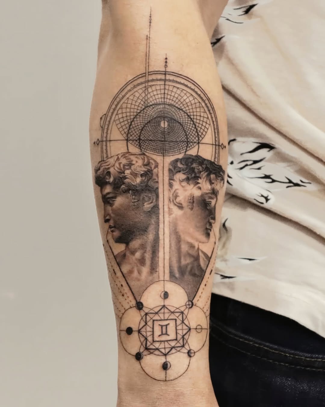 Stylish Gemini tattoo blending art and astrology Tattoo Design