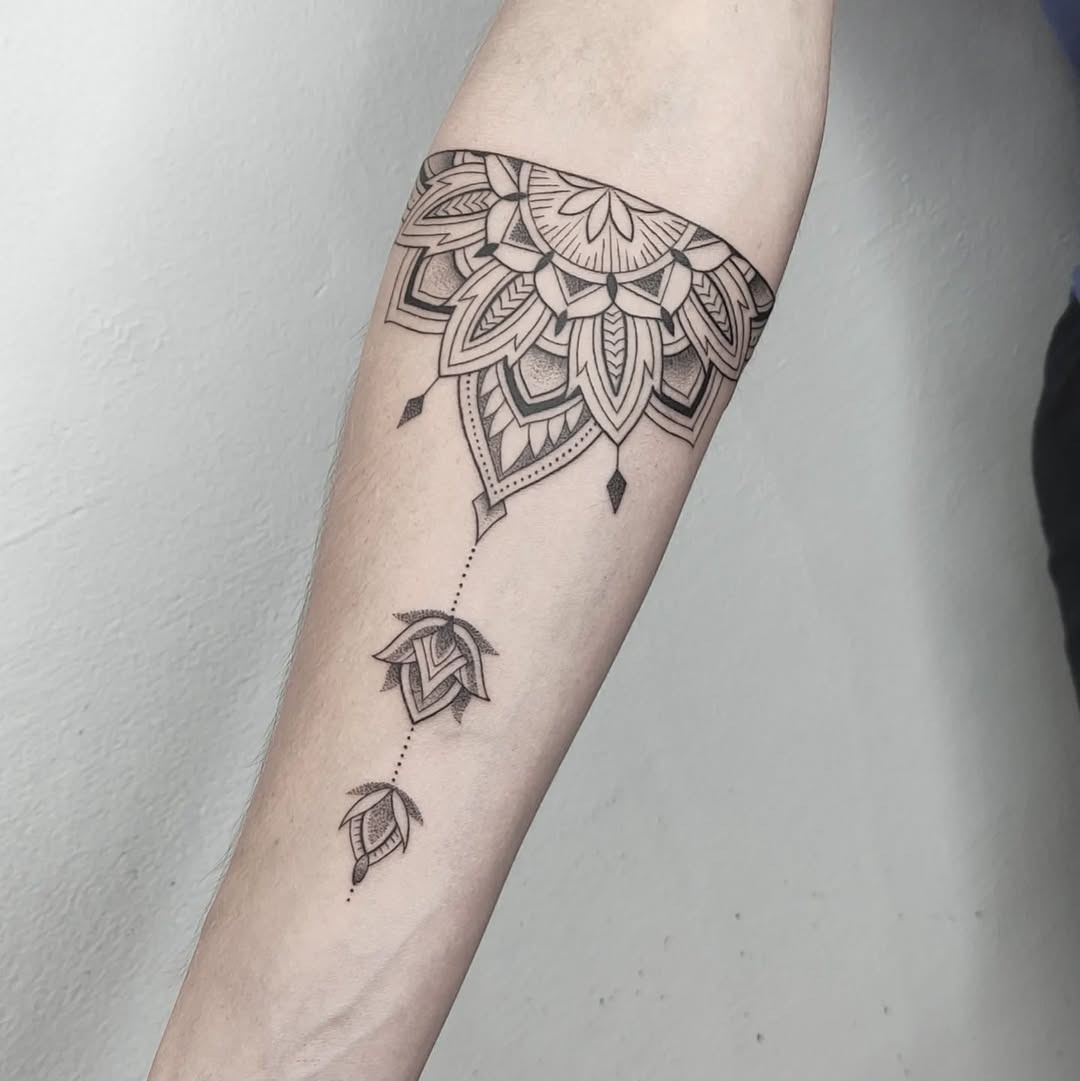 Elegant Mandala Design with Delicate Drops Tattoo Design
