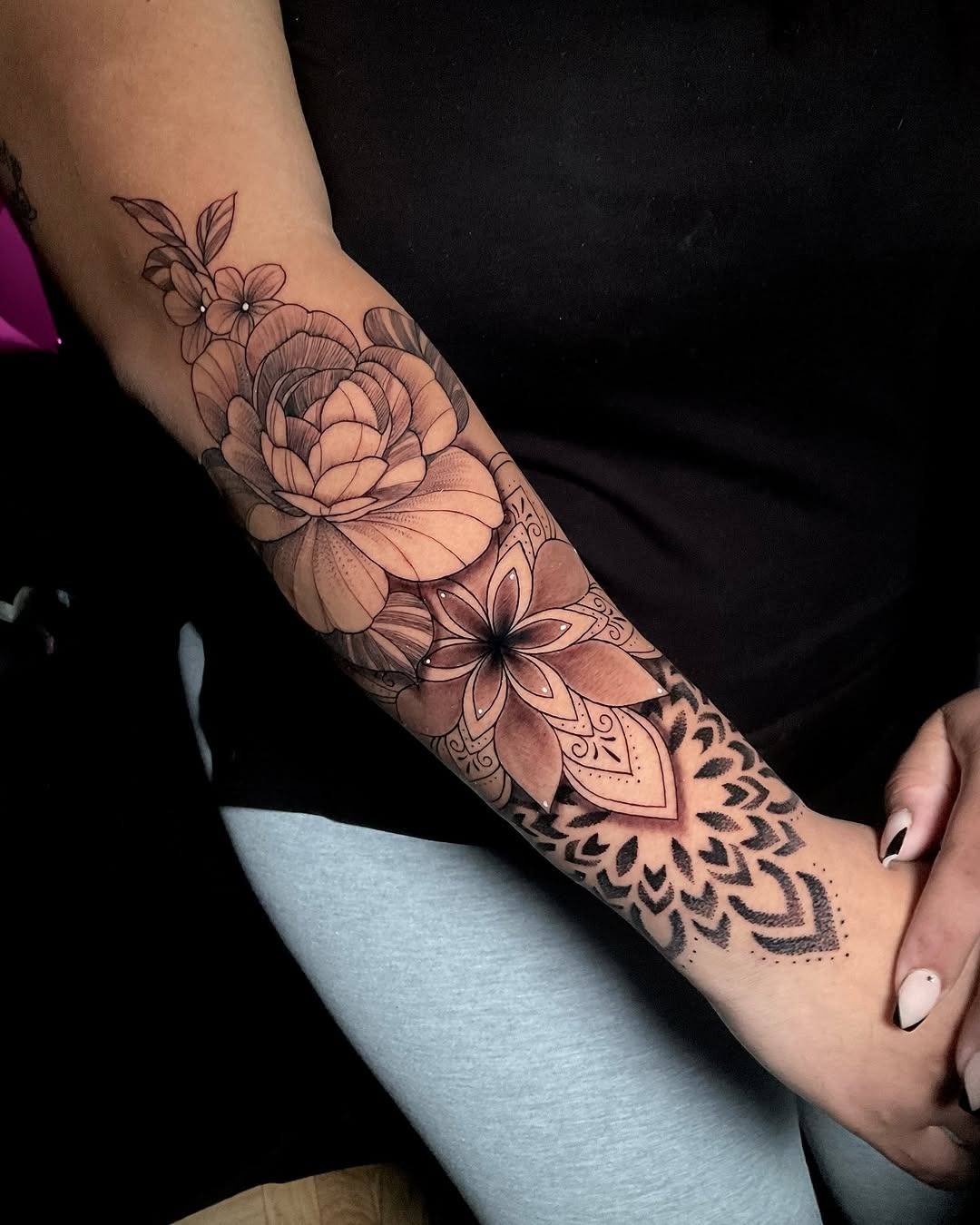 Intricate floral mandala arm tattoo design Tattoo Design
