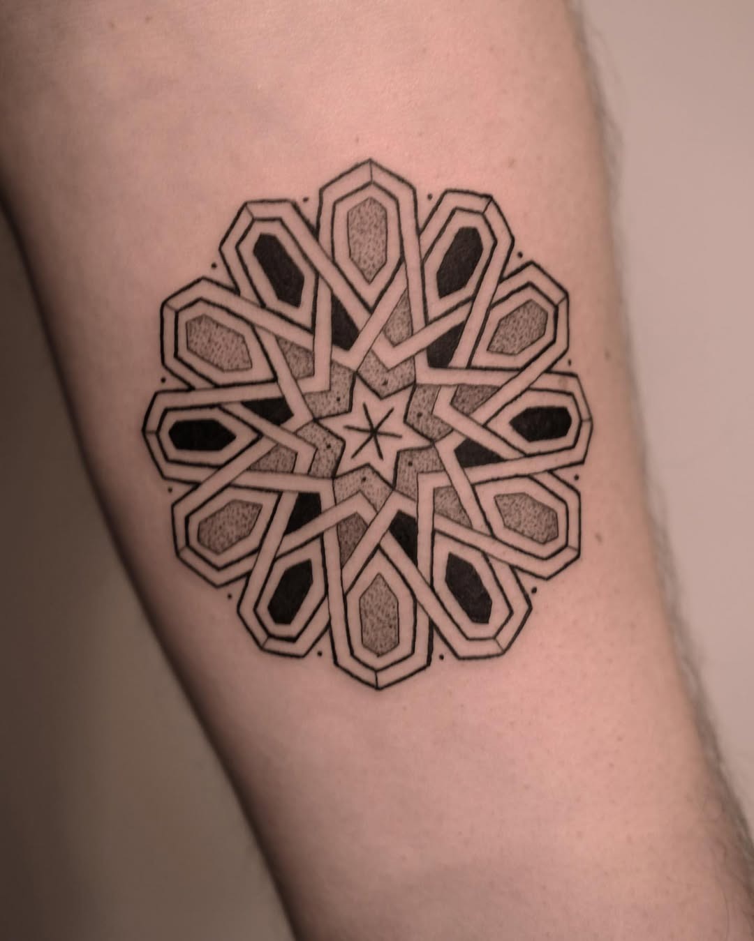 Intricate mandala tattoo featuring geometric patterns Tattoo Design