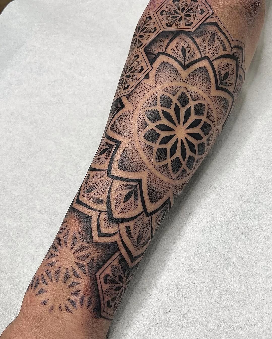 Intricate Mandala Tattoo Showcasing Geometric Patterns Tattoo Design