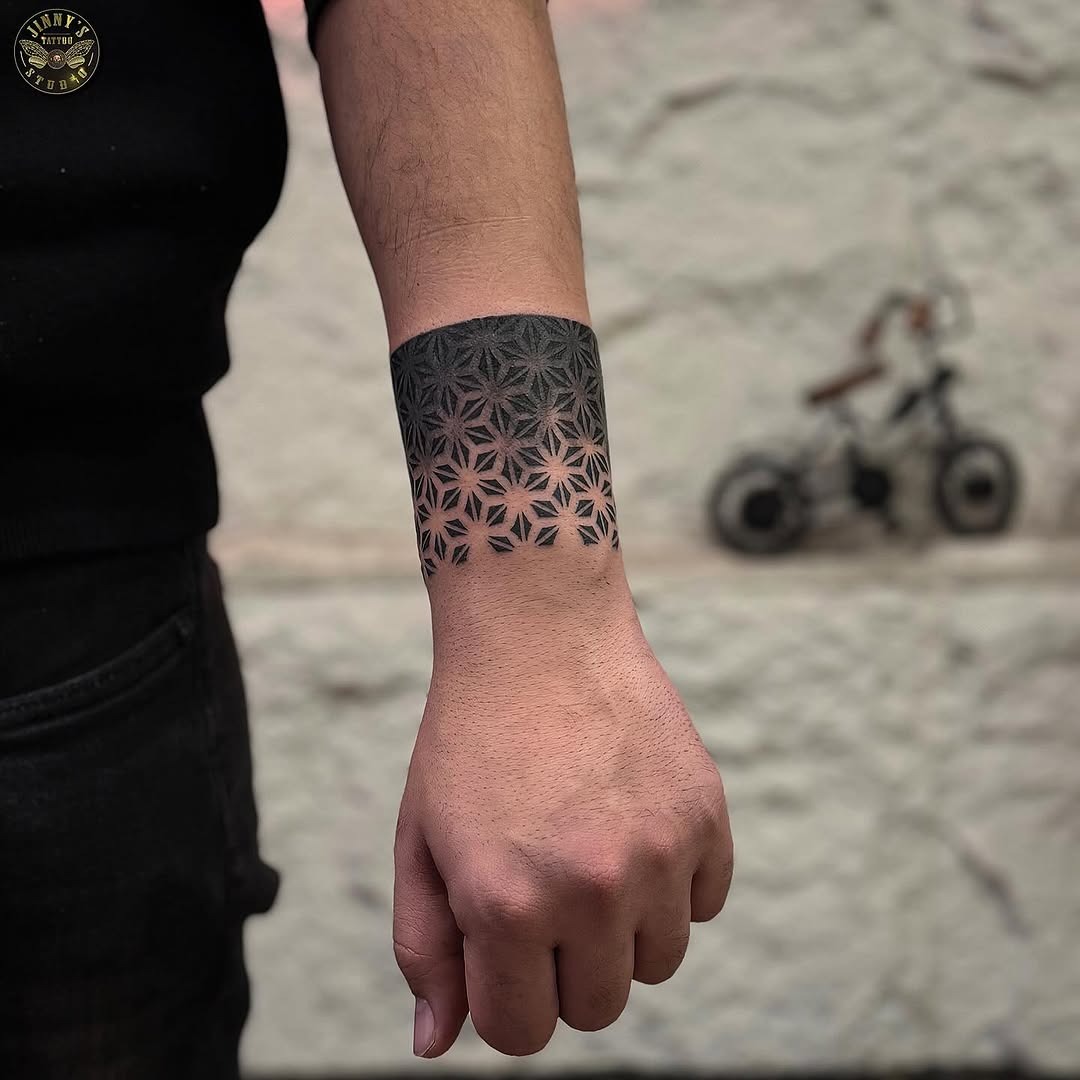 Stunning geometric mandala tattoo on forearm Tattoo Design