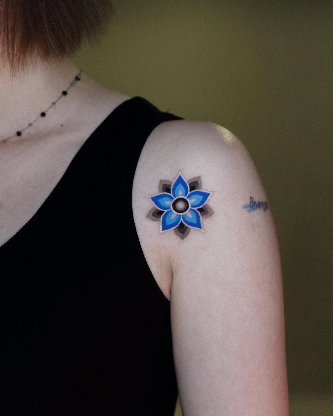 Stylish blue mandala flower tattoo on shoulder Tattoo Design