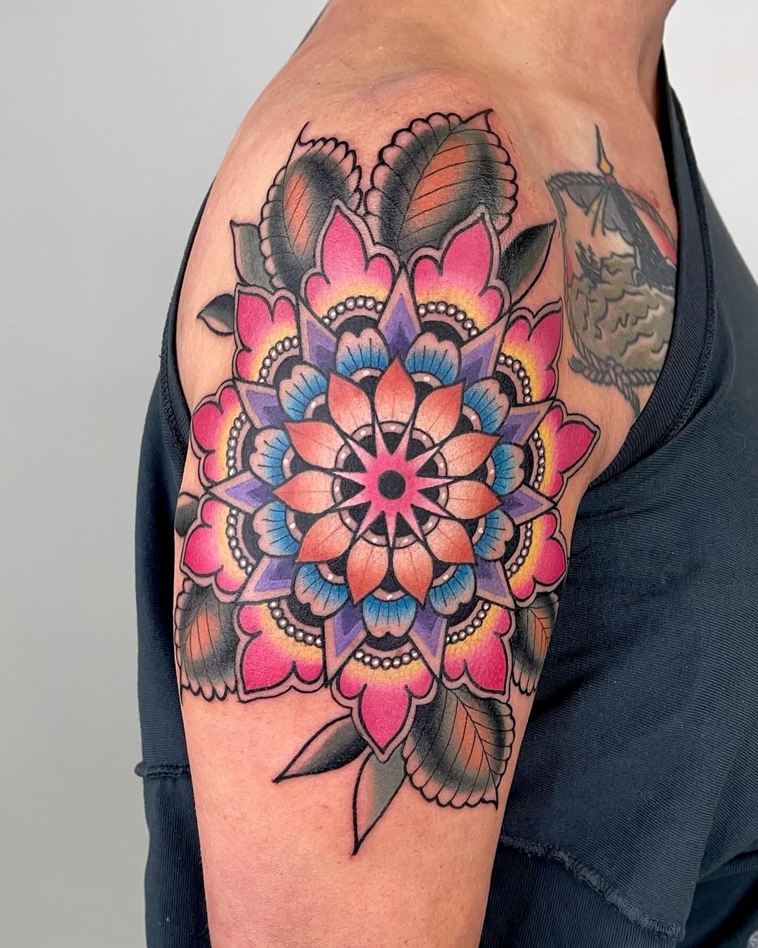 Vibrant floral mandala tattoo showcasing intricate details Tattoo Design