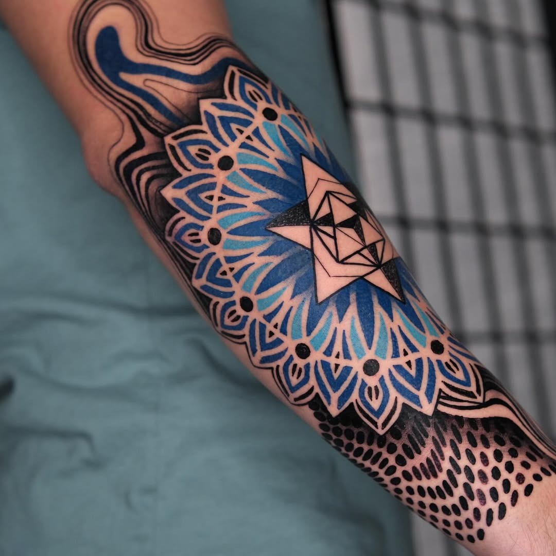 Vibrant mandala tattoo on forearm Tattoo Design