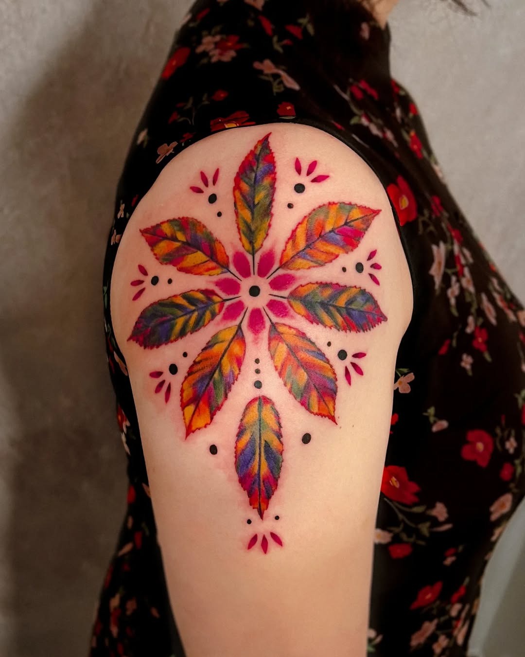 Vibrant mandala tattoo with floral elements Tattoo Design