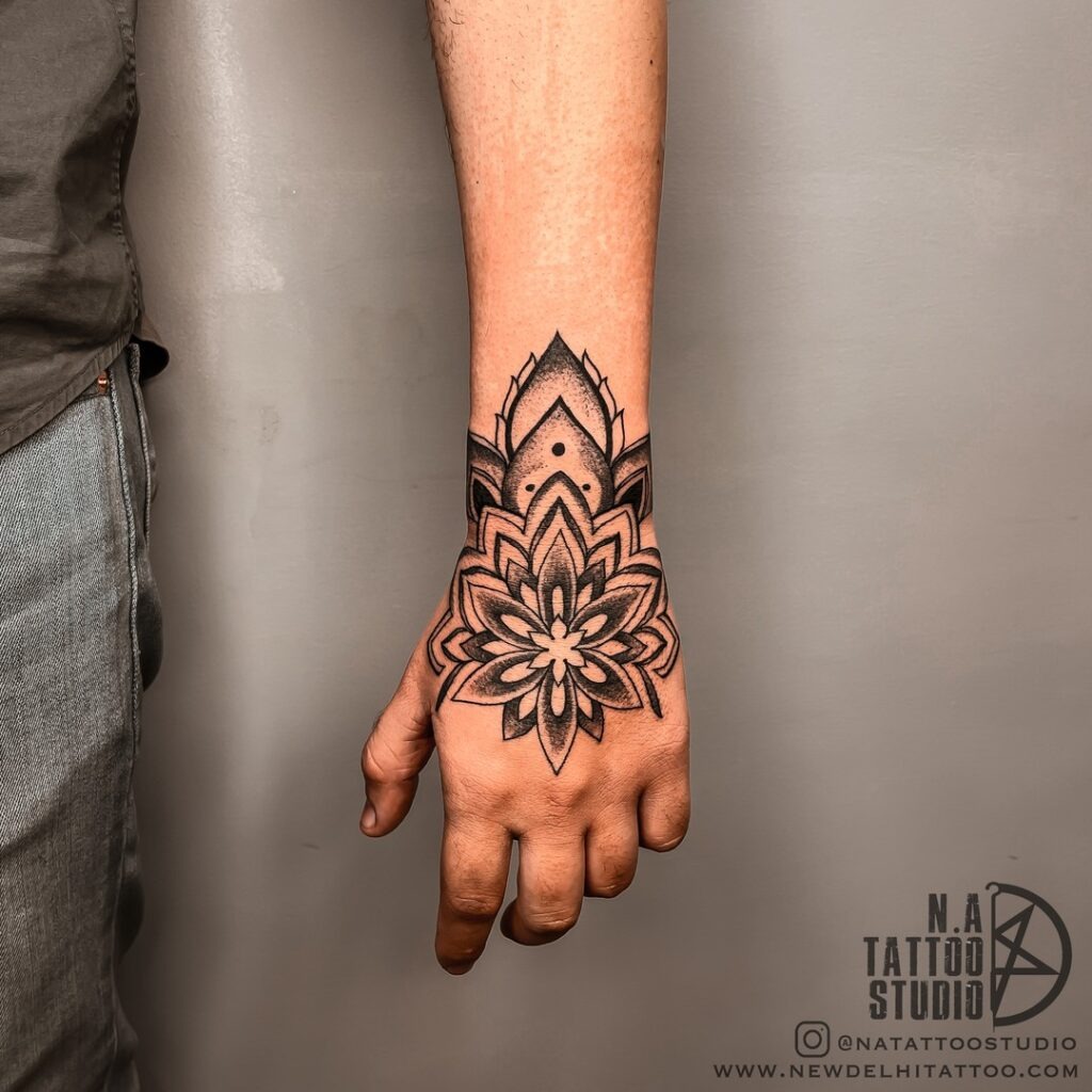 Bold Mandala Hand Tattoo with Dark Shading Tattoo Design