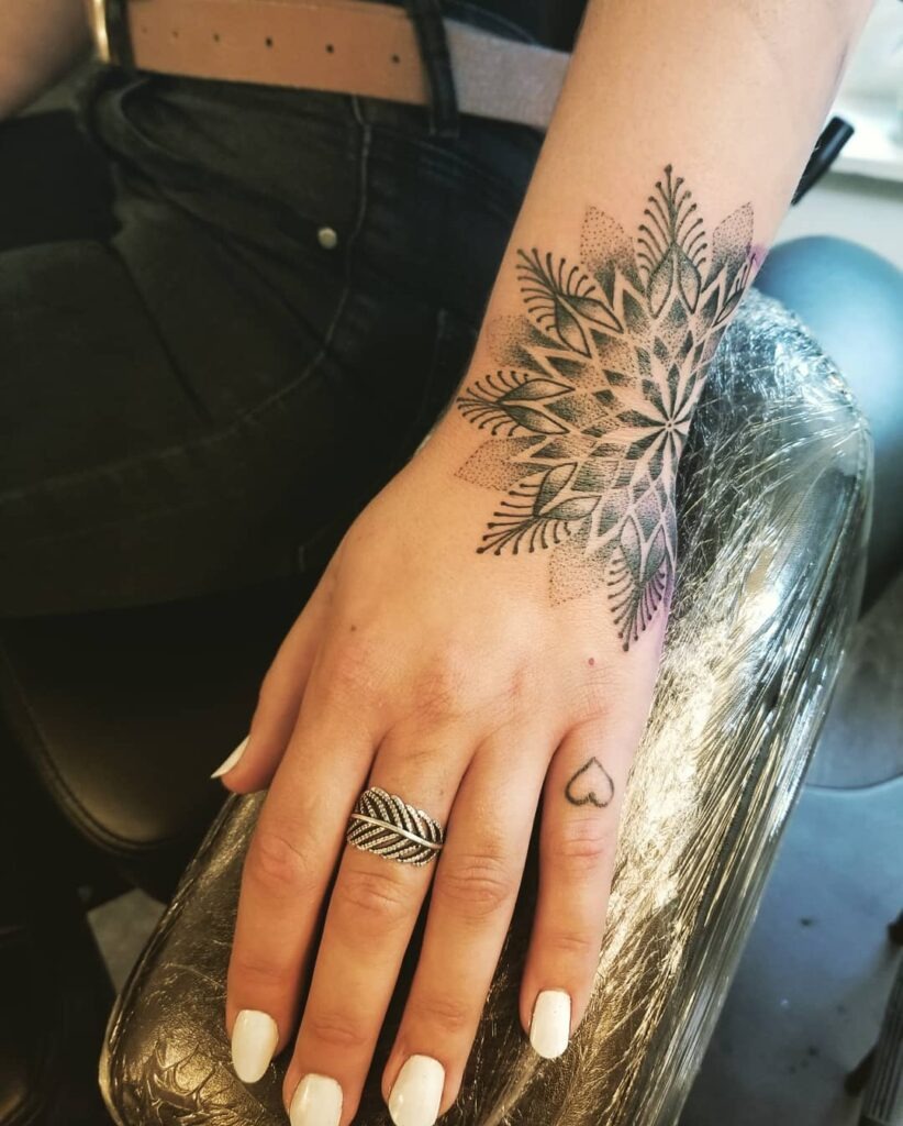 Bold Mandala Wrist and Hand Tattoo Tattoo Design