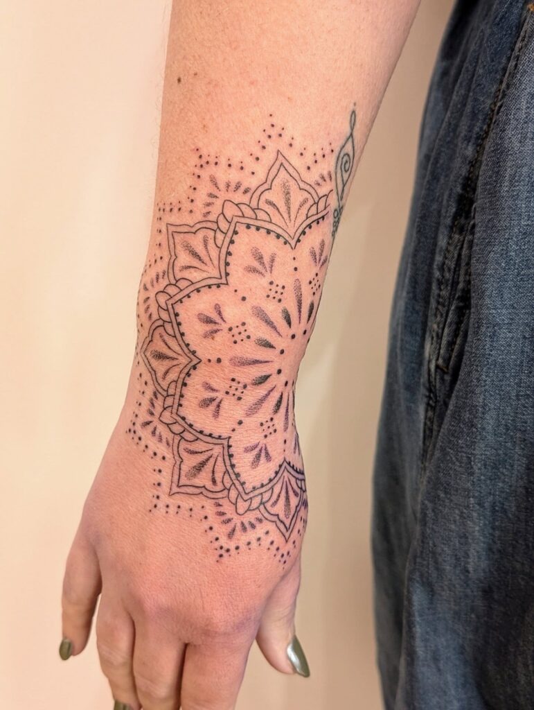 Elegant Hand Mandala Tattoo with Delicate Dotted Accents Tattoo Design