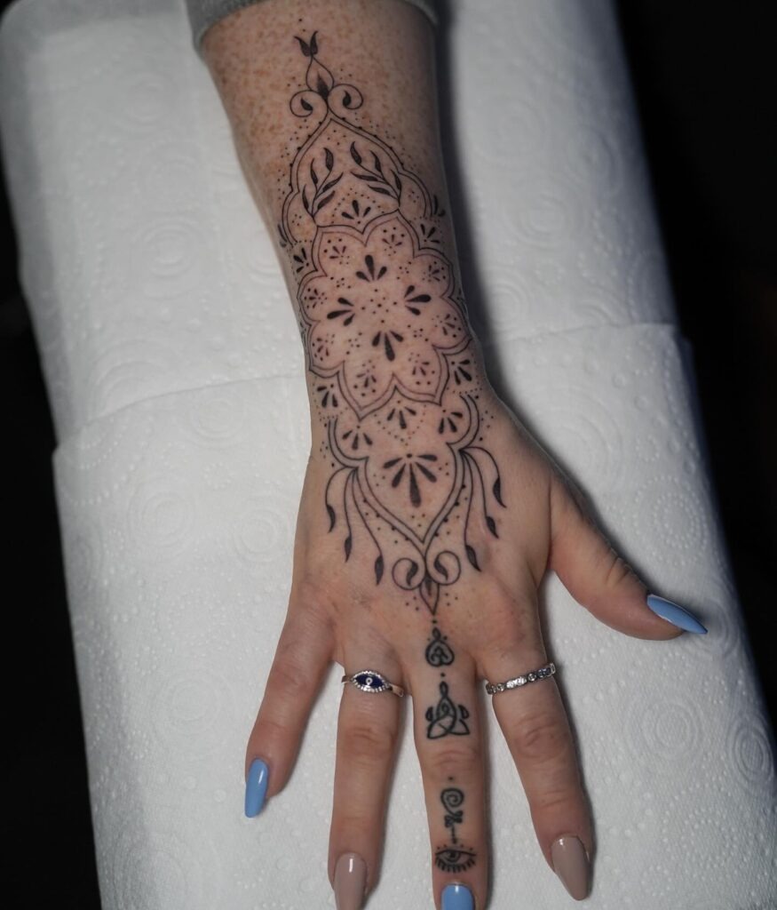 Ornamental Mandala-Inspired Hand and Wrist Tattoo Tattoo Design