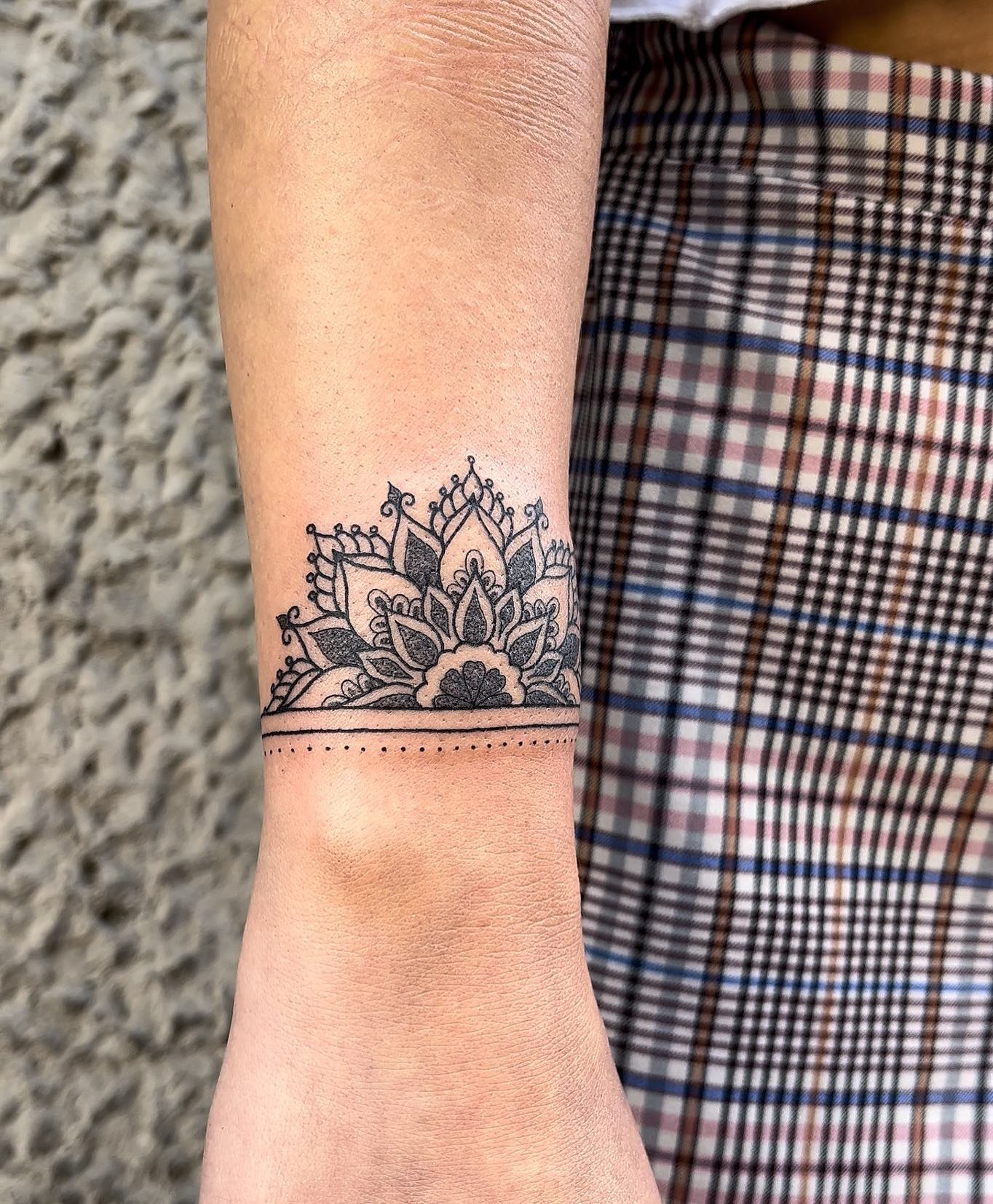 Ornamental Mandala Wrist Tattoo with Dotted Accents Tattoo Design