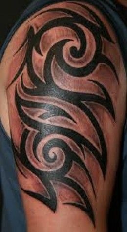 Compact Upper Arm Tribal Tattoo with Heavy Black Curves Tattoo Design