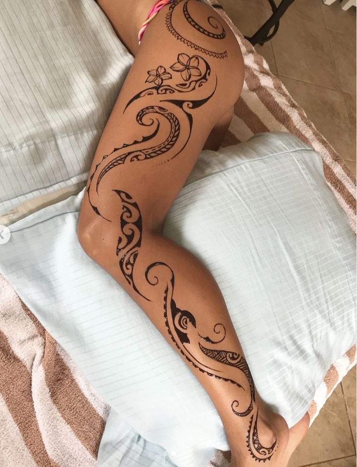 Feminine Leg Tribal Tattoo with Floral Swirls Tattoo Design