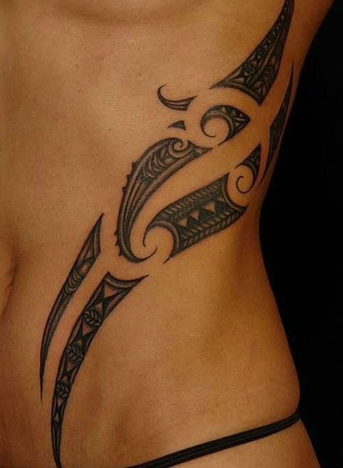 Side Rib Tribal Tattoo with Sharp Negative Space Tattoo Design