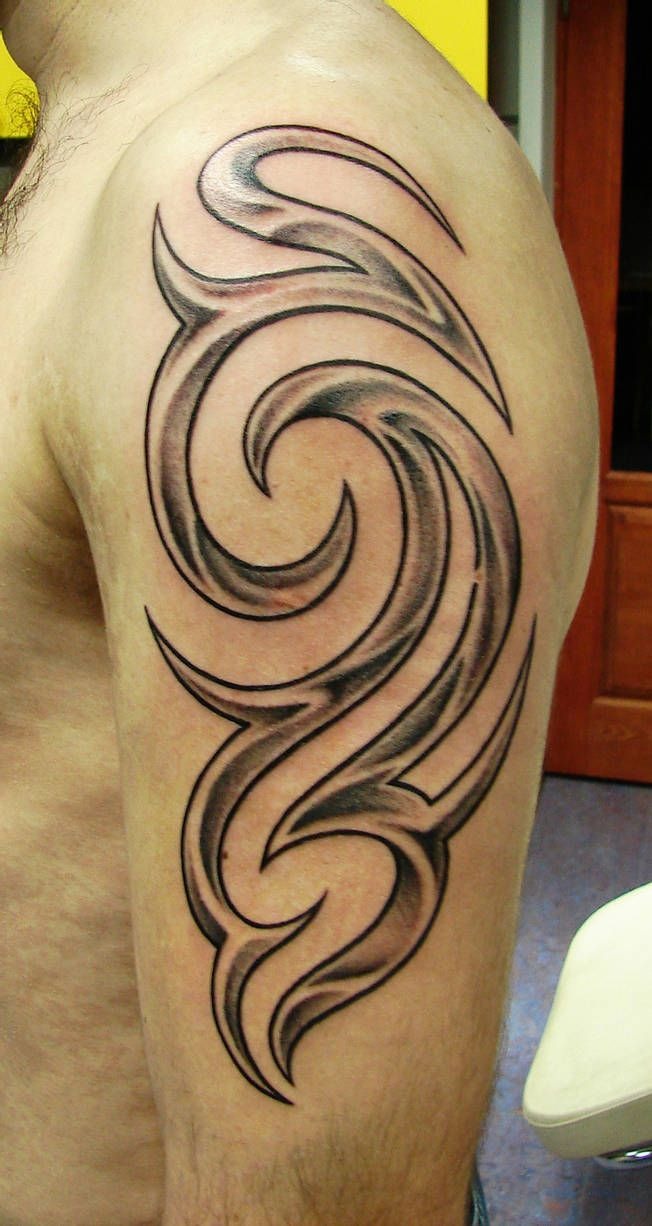 Soft-Shaded Tribal Shoulder Tattoo with Smoke-Like Curves Tattoo Design