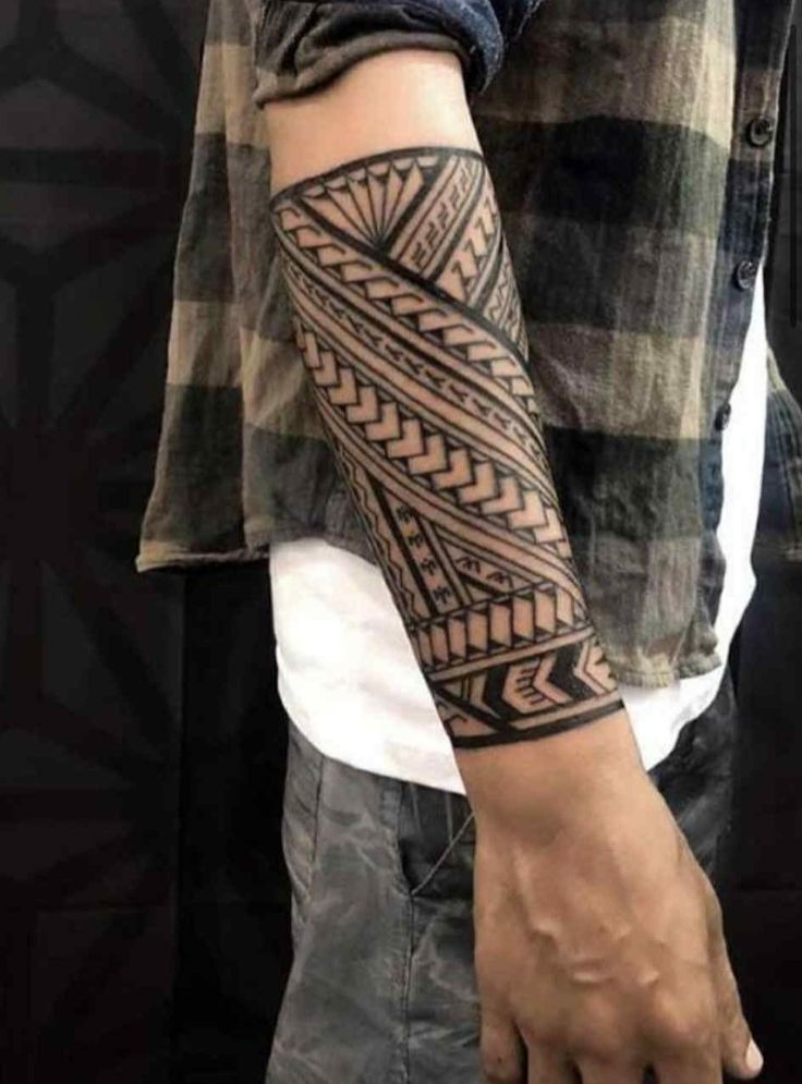 Wrapped Forearm Tribal Band with Polynesian-Inspired Detail Tattoo Design