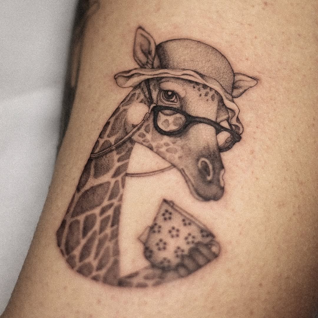 Adorable giraffe tattoo with vintage accessories Tattoo Design