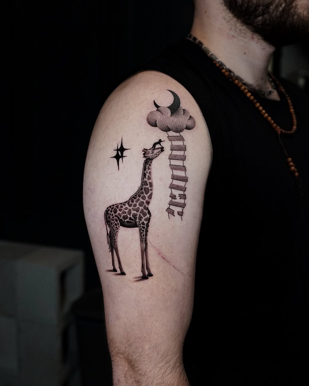 Artistic Giraffe Tattoo with Surreal Elements Tattoo Design