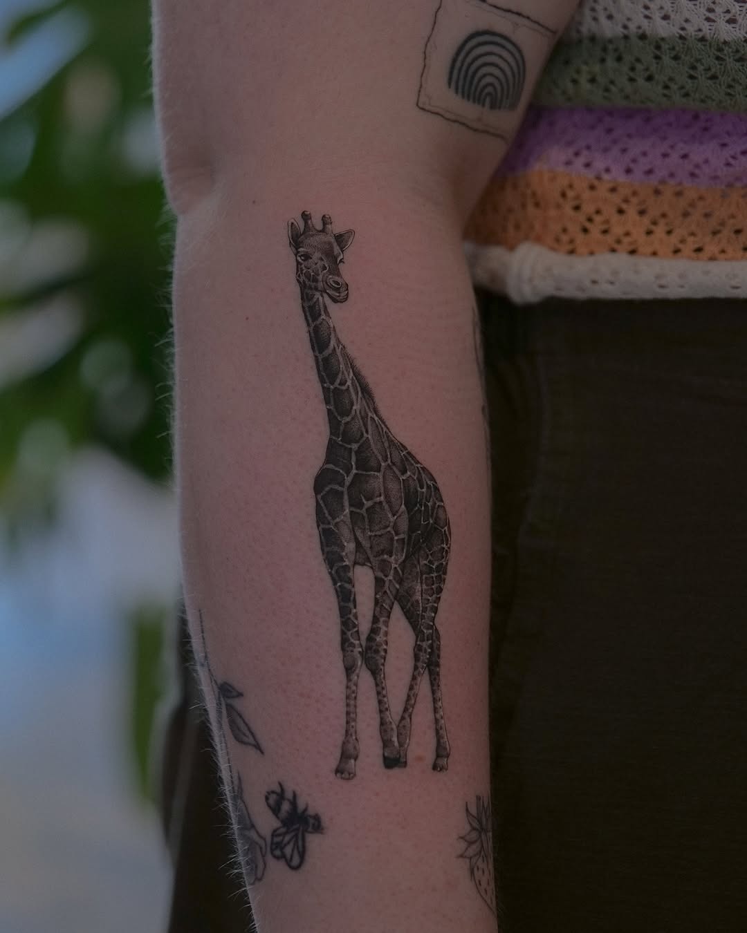 Elegant Giraffe Tattoo on Forearm Tattoo Design