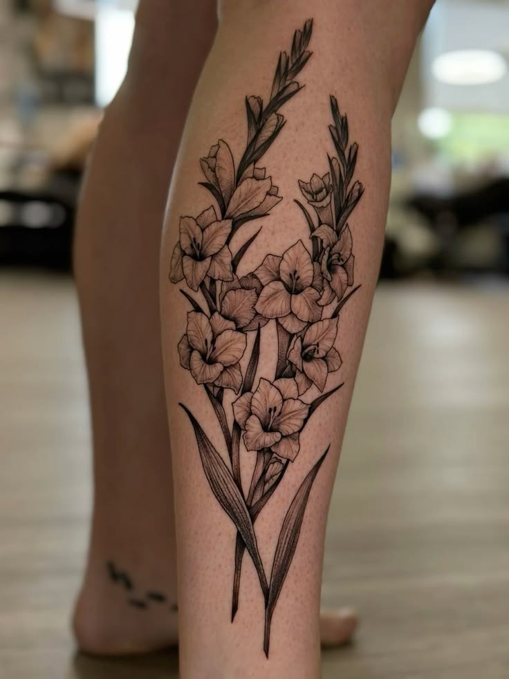 Flowing Line Gladiolus Tattoo Design