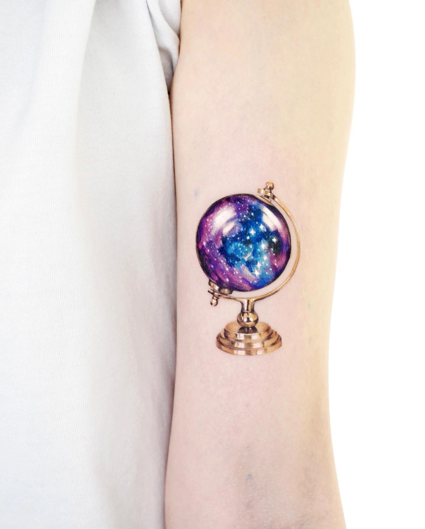 Stunning Cosmic Globe Tattoo for Adventure Lovers Tattoo Design
