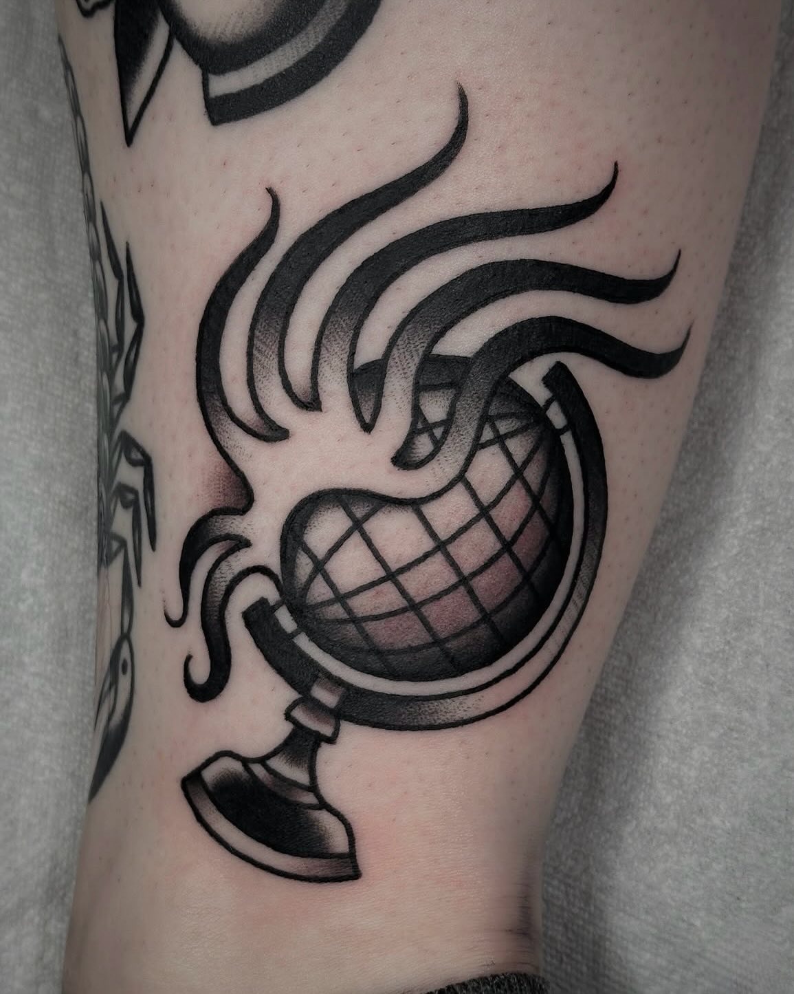 Stylish globe tattoo with flaming design Tattoo Design