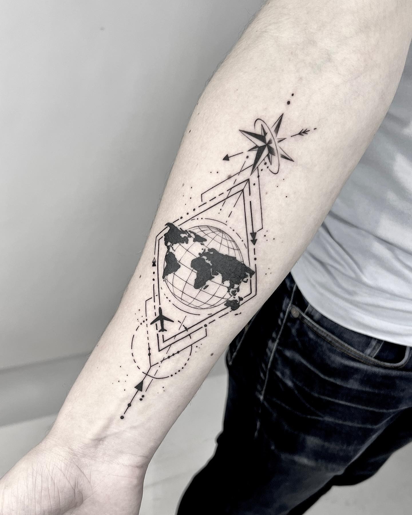 Stylish globe tattoo with modern geometrical elements Tattoo Design