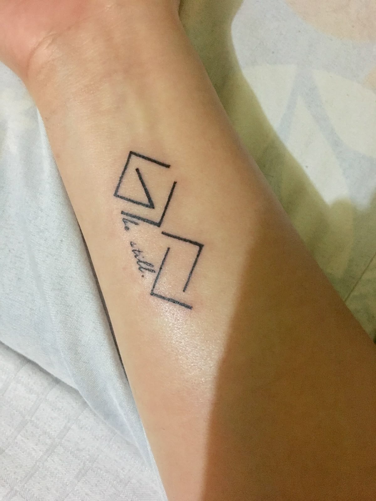 Bold Cross and Symbol Forearm Tattoo Tattoo Design
